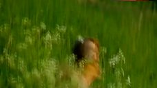 8. Vanessa Paradis Shows Nude Boobs in the Field – Noce Blanche