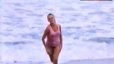 1. Andrea Thompson Bikini Scene – Hot Splash