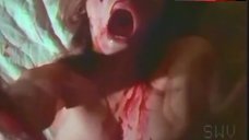 6. Gina Morett Exposed Boobs – Night Of The Bloody Apes