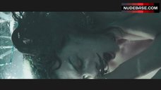 9. Milla Jovovich Nude in Aquarium – Resident Evil: Apocalypse