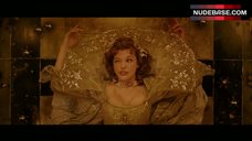 1. Milla Jovovich Cleavage – The Three Musketeers
