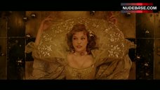 4. Milla Jovovich Cleavage – The Three Musketeers