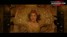 5. Milla Jovovich Cleavage – The Three Musketeers