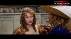 1. Milla Jovovich Boobs Out – The Three Musketeers
