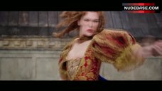 6. Milla Jovovich Boobs Out – The Three Musketeers