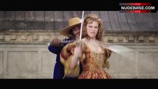 7. Milla Jovovich Boobs Out – The Three Musketeers