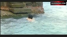 4. Regina Orioli Topless on Beach – Ovosodo