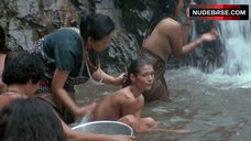 10. Charlotte Lewis Topless in Waterfall – Men Of War