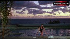 1. Carey Lowell Sexy in Wet Swimsuit – Dangerously Close