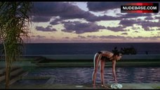 2. Carey Lowell Sexy in Wet Swimsuit – Dangerously Close
