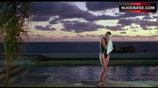3. Carey Lowell Sexy in Wet Swimsuit – Dangerously Close