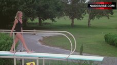 9. Cindy Morgan Sexy in Black Swimsuit – Caddyshack