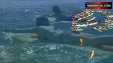 3. Michelle Borth Surfing in Sexy Bikini – Hawaii Five