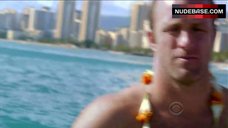 9. Michelle Borth Surfing in Sexy Bikini – Hawaii Five