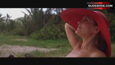 6. Rene Russo Topless Sunbathing – The Thomas Crown Affair