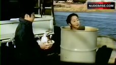 6. Misa Jono Bathing in Oil Drum – Nurunuru Kankan