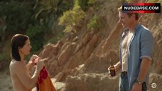 7. Delphine Chaneac Topless on Beach – Transporter: The Series