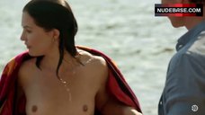 8. Delphine Chaneac Topless on Beach – Transporter: The Series