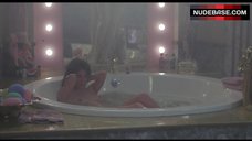 5. Nancy Travis Nude in Hot Tub – Married To The Mob