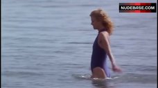 10. Kyra Sedgwick in Blue Swimsuit – Losing Chase