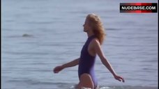 9. Kyra Sedgwick in Blue Swimsuit – Losing Chase