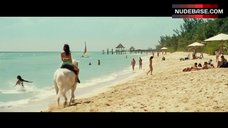 4. Caterina Murino Riding Horse in Bikini – Casino Royale