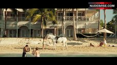 8. Caterina Murino Riding Horse in Bikini – Casino Royale