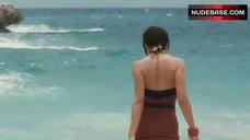 7. Caterina Murino Flashes Ass – The Garden Of Eden