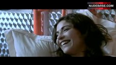 9. Lubna Azabal Naked on Bed – Exiles