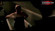 10. Nadine Riess Lying in Bathtub – 3 Below