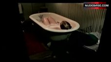 2. Nadine Riess Lying in Bathtub – 3 Below