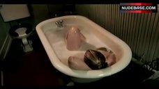4. Nadine Riess Lying in Bathtub – 3 Below