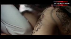 2. Naomi Tani Nude Scene – Tattooed Flower Vase
