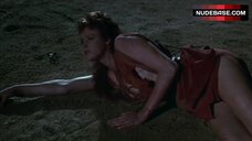 2. Brigitte Nielsen Breasts Flash – Red Sonja