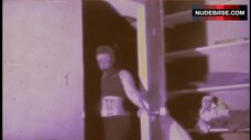 7. Benita Hudson Bare Breasts – Hooker With A Hacksaw