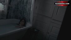 9. Suilma Rodriguez in Bathtub – The Perfect Host: A Southern Gothic Tale