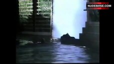 12. Brigitte Nielsen Flashes Boobs and Butt – Domino