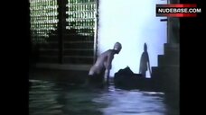 45. Brigitte Nielsen Flashes Boobs and Butt – Domino