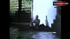 56. Brigitte Nielsen Flashes Boobs and Butt – Domino