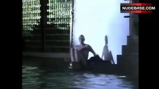 67. Brigitte Nielsen Flashes Boobs and Butt – Domino