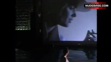 1. Brigitte Nielsen Exposed Breasts – Domino