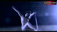 4. Makoto Shinohara Nude Gymnastics – A Woman Wearing A Leotard
