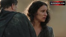 2. Indira Varma Naked Boobs – World Without End