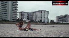 1. Kandis Erickson Topless on Beach – After The Wedding