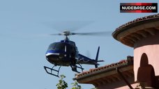 23. Sexy Eliza Dushku in Black Swimsuit – The Saint