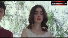 1. Lily Collins Lying Nude on Groung – To The Bone