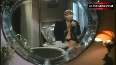 45. Kelly McGillis in Black Underwear – Cat Chaser