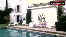 1. Daniela Poggi Topless Sunbathing – Il Paramedico