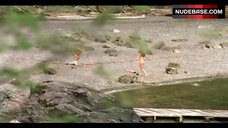 45. Erica Durance Topless on Beach – House Of The Dead