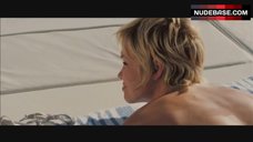 12. Ashley Scott Topless Sunbathing – Into The Blue